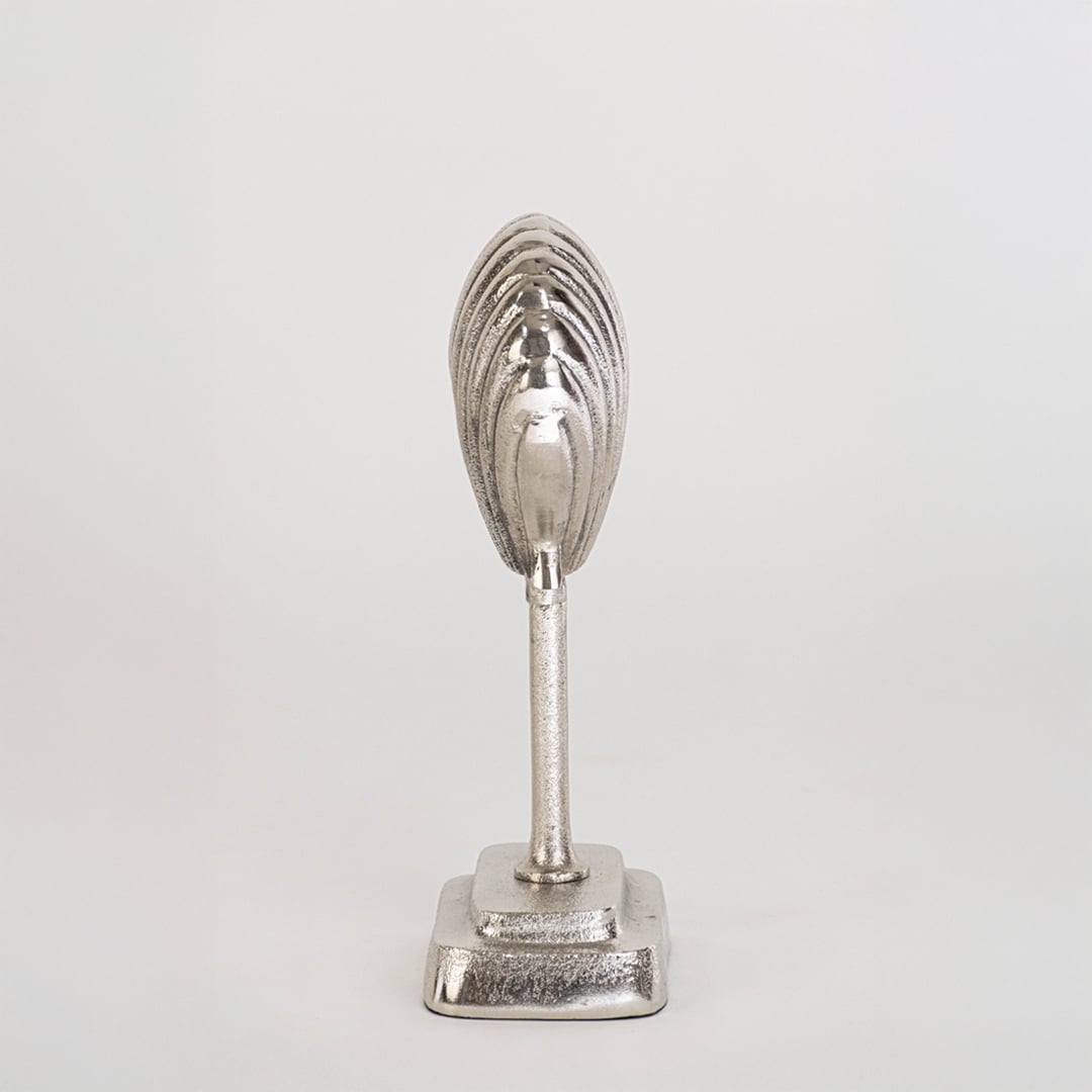 Metallic silver seashell sculpture with stand clearly displayed on plain white background for clean product showcase