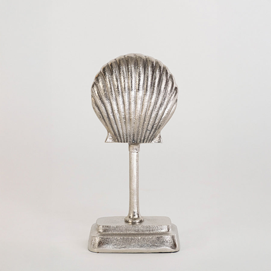 Decorative shell sculpture in silver finish for table decor or shelf styling modern home placement white background.