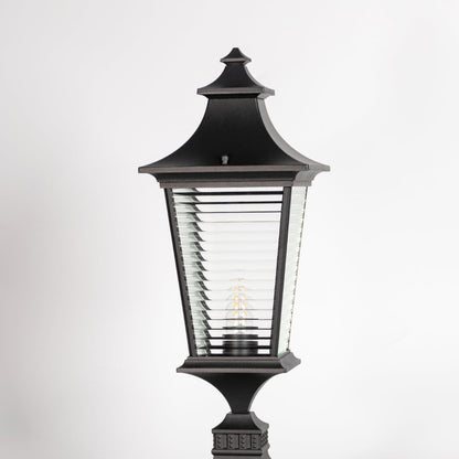 Closeup of black pillar light showing ribbed glass and sleek frame for a premium modern outdoor look.