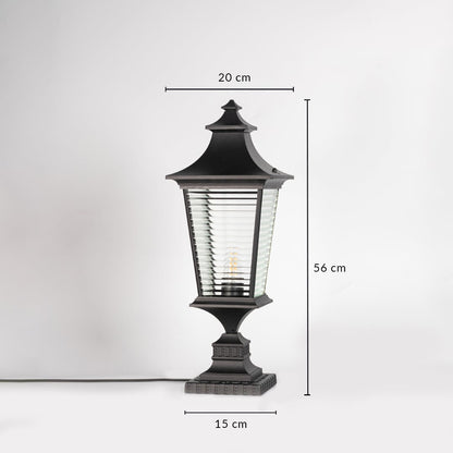 Black pillar light with ribbed glass measuring 56 cm height and 20 cm width ideal for outdoor pillar mounting.