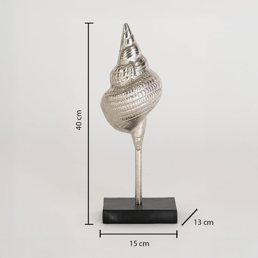 Silver metal conch sculpture on stand shown with 40 cm height and 15 cm width for accurate placement in modern interior accent decor spaces.