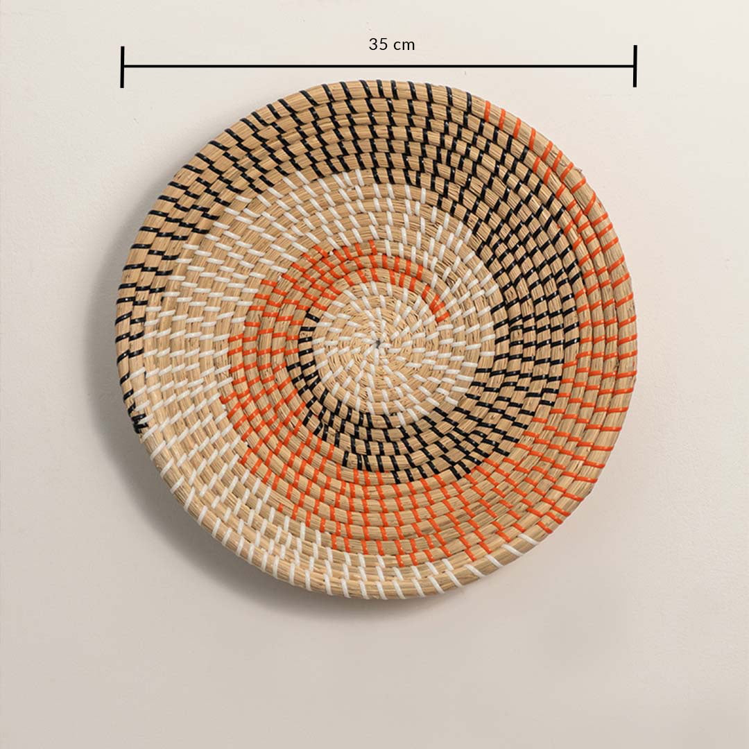 Wall plate with spiral orange and black weaving size 35 cm diameter with measurement display.