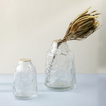 Set of clear embossed glass vases with leaf texture for decorative arrangements Grouped Image.