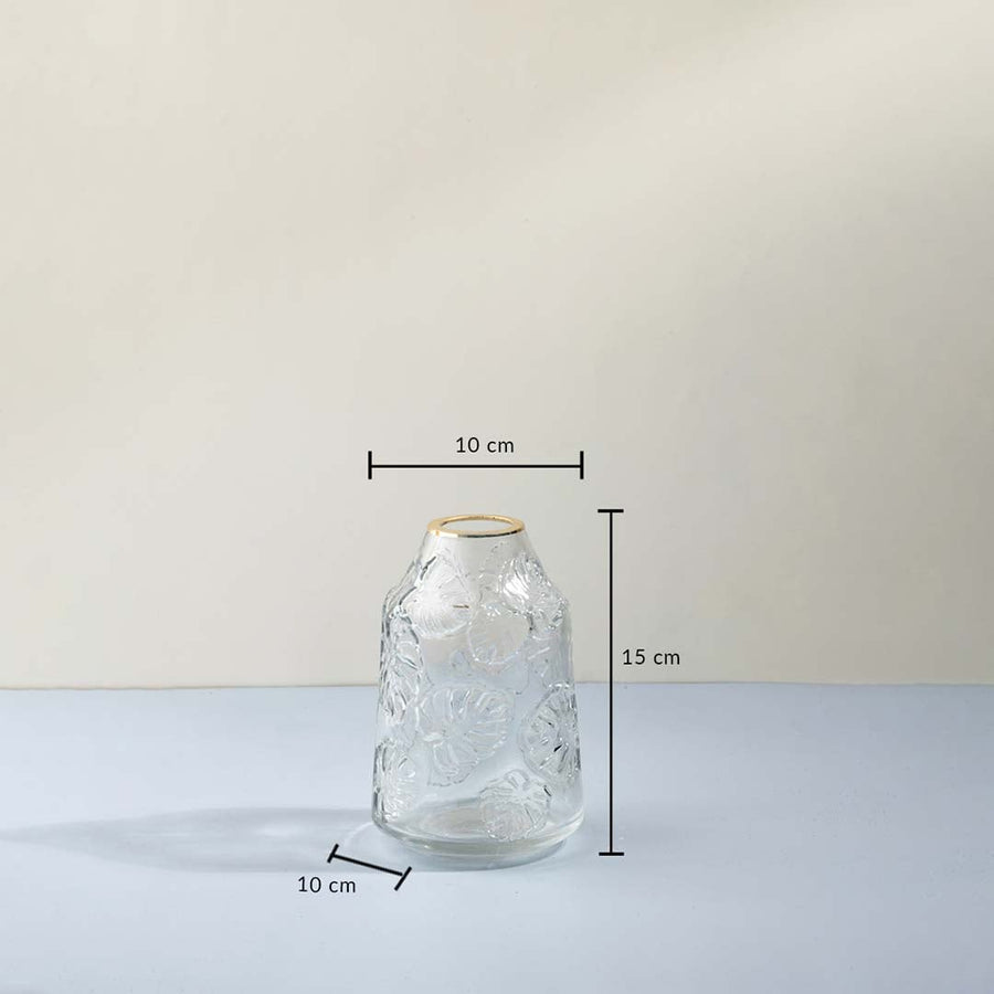 Transparent embossed glass flower vase with golden rim 15 cm height 10 cm width dimension image for table decor.