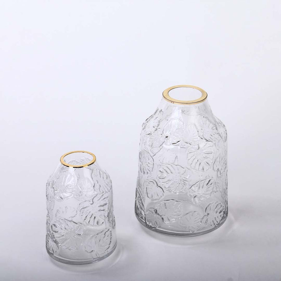 Set of transparent embossed glass vases with golden rim grouped image ideal for modern home table decoration styling.
