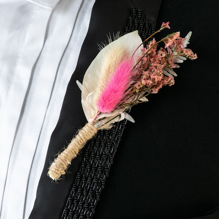Handmade dried flower boutonniere with preserved pink bloom natural foliage and jute wrap perfect for groom wedding accessory.
