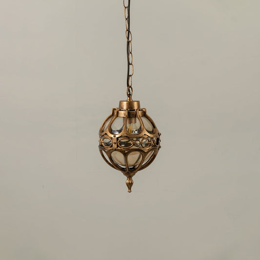 Unlit black metal globe hanging light fixture with decorative circular pattern cage isolated against a plain white background.