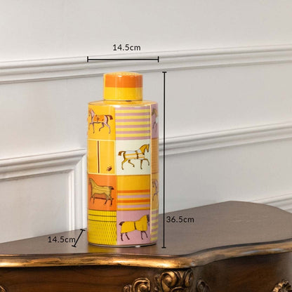 Yellow ceramic jar with horse illustrations measuring 12.5 cm width and 34.5 cm height ideal for bold hallway décor and console styling.
