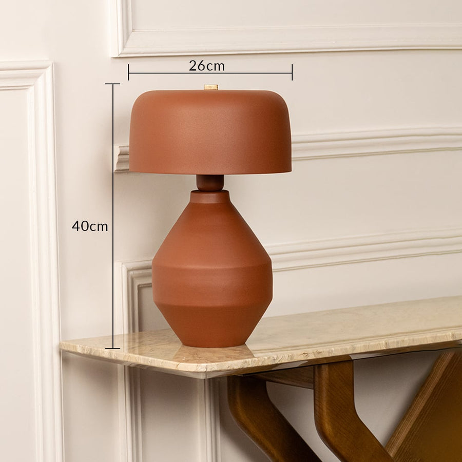 Terracotta ceramic table lamp with dome shade measuring 44 cm height and 25 cm width for modern interiors.