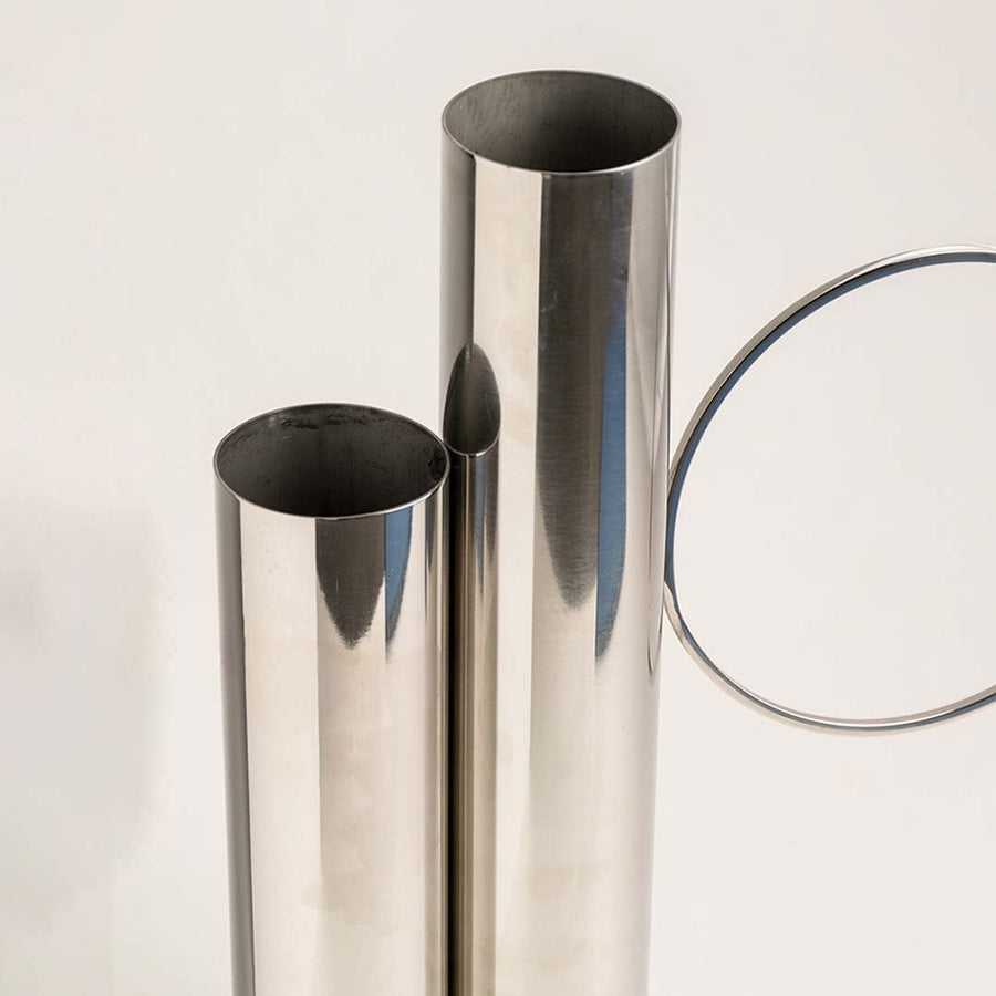 Detailed view of the shiny silver metal surface showing the precision of craftsmanship and elegant curvature.