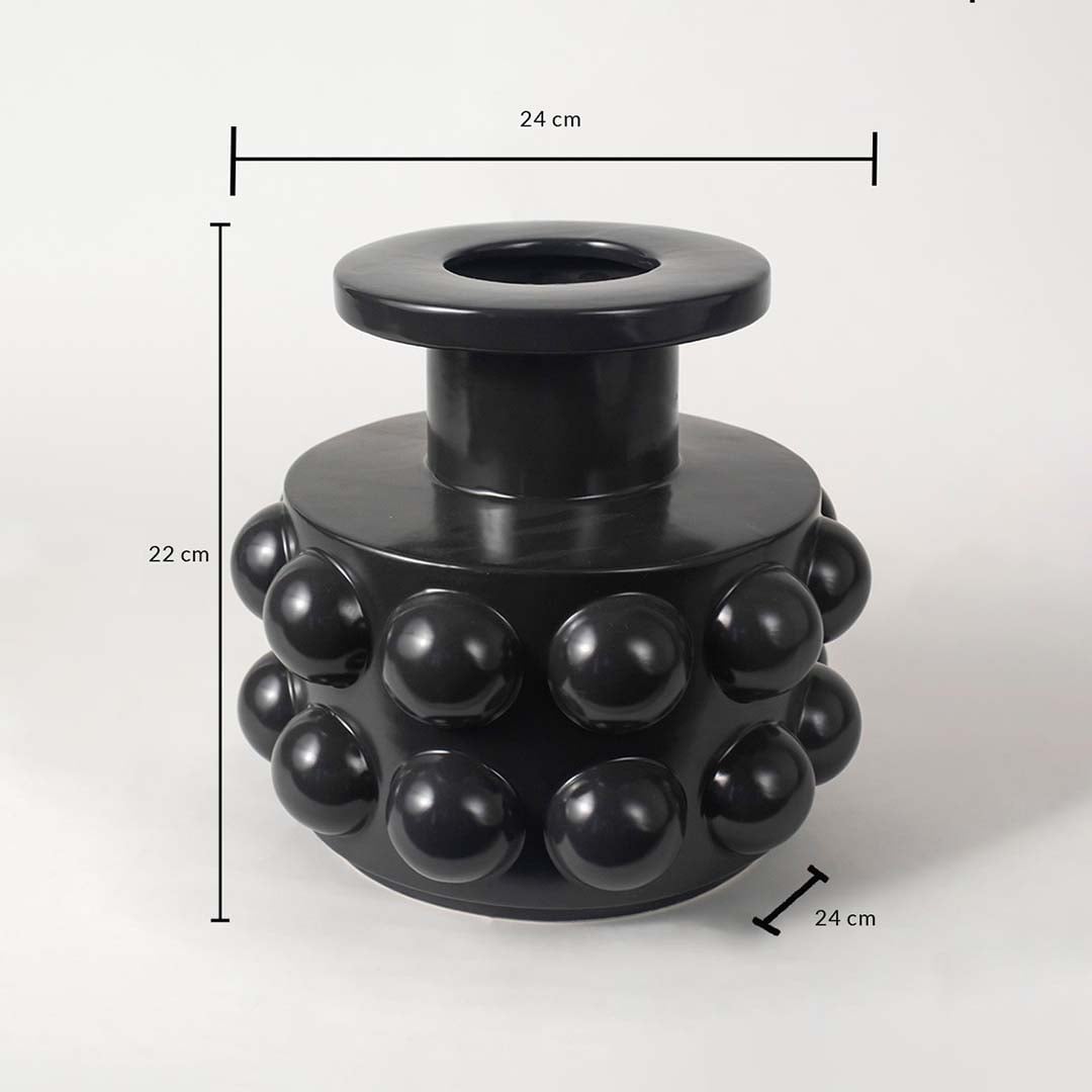 Black ceramic vase measuring 22 cm in height and 24 cm in width featuring a glossy spherical textured surface.