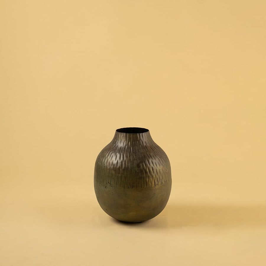 Brown hammered metal vase decor on clean white background ideal for modern shelves consoles and tabletop styling.