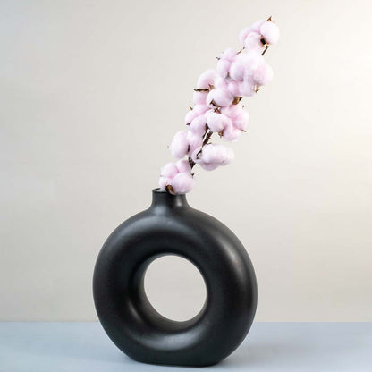 Pink cotton stem preserved artificial floral decor lifestyle display on white background for modern interiors.
