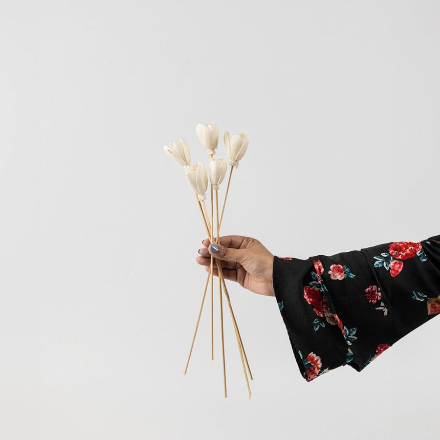 Tulip artificial ivory flower stick with natural stem displayed on white background for stylish home decoration accents.