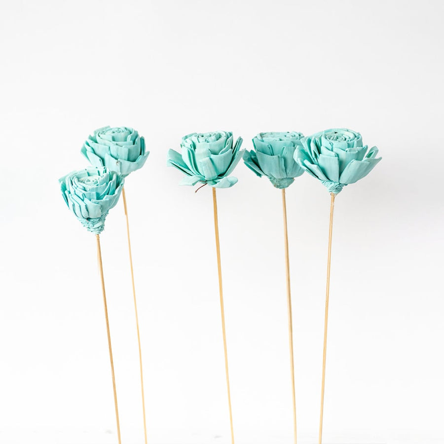 Set of five blue dried flowers with natural stems displayed together ideal for stylish vase arrangements and decor.