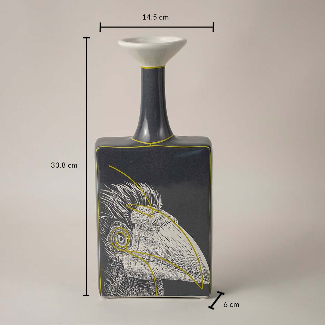 Black and white ceramic vase with bird art design showing 33.8 cm height 14.5 cm width and 6 cm depth on white background.