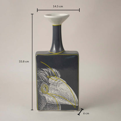 Black and white ceramic vase with bird art design showing 33.8 cm height 14.5 cm width and 6 cm depth on white background.