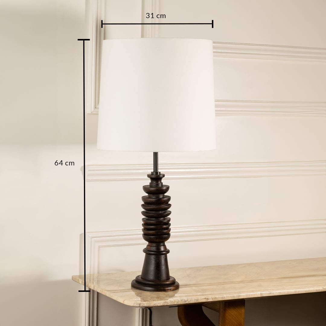 Dark wood table lamp with white fabric shade measuring 64 cm height and 31 cm width for classic interior decor.