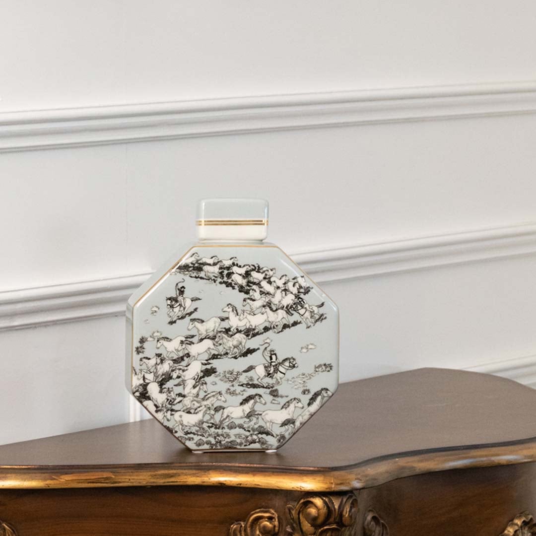 White octagon ceramic jar with grey floral artwork in a front view ideal for subtle tabletop décor and elegant living room styling.