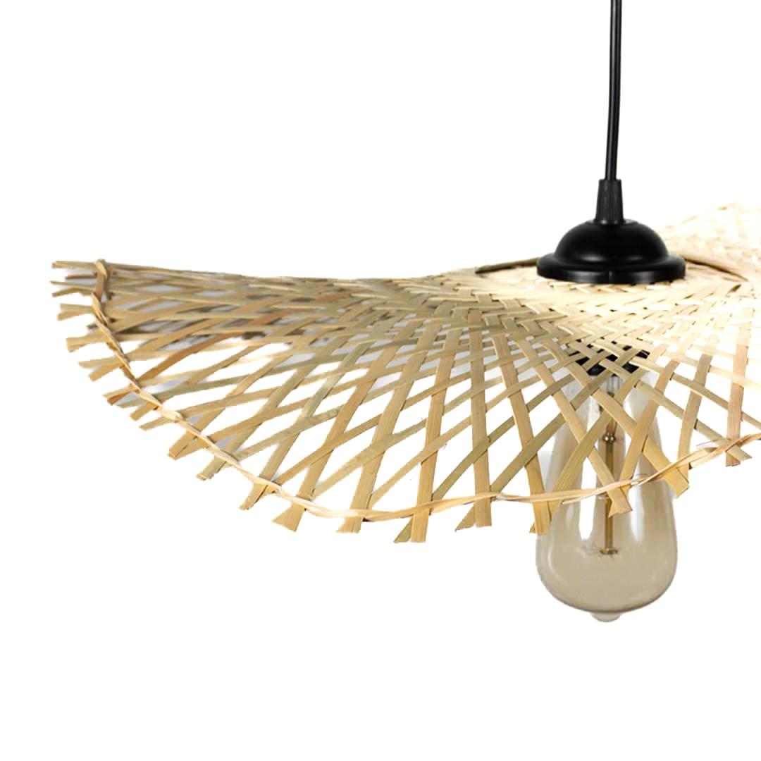 Closeup of rattan pendant light with handwoven bamboo shade and exposed bulb in natural finish.