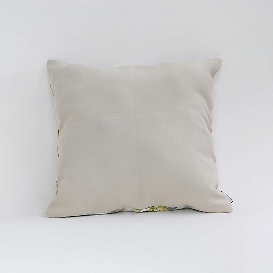 Backside of the cushion cover in soft beige cotton fabric offering a clean minimal décor style with a breathable durable and skin friendly material suitable for modern home settings.