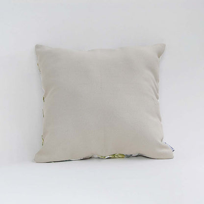 Backside of the cushion cover in soft beige cotton fabric offering a clean minimal décor style with a breathable durable and skin friendly material suitable for modern home settings.