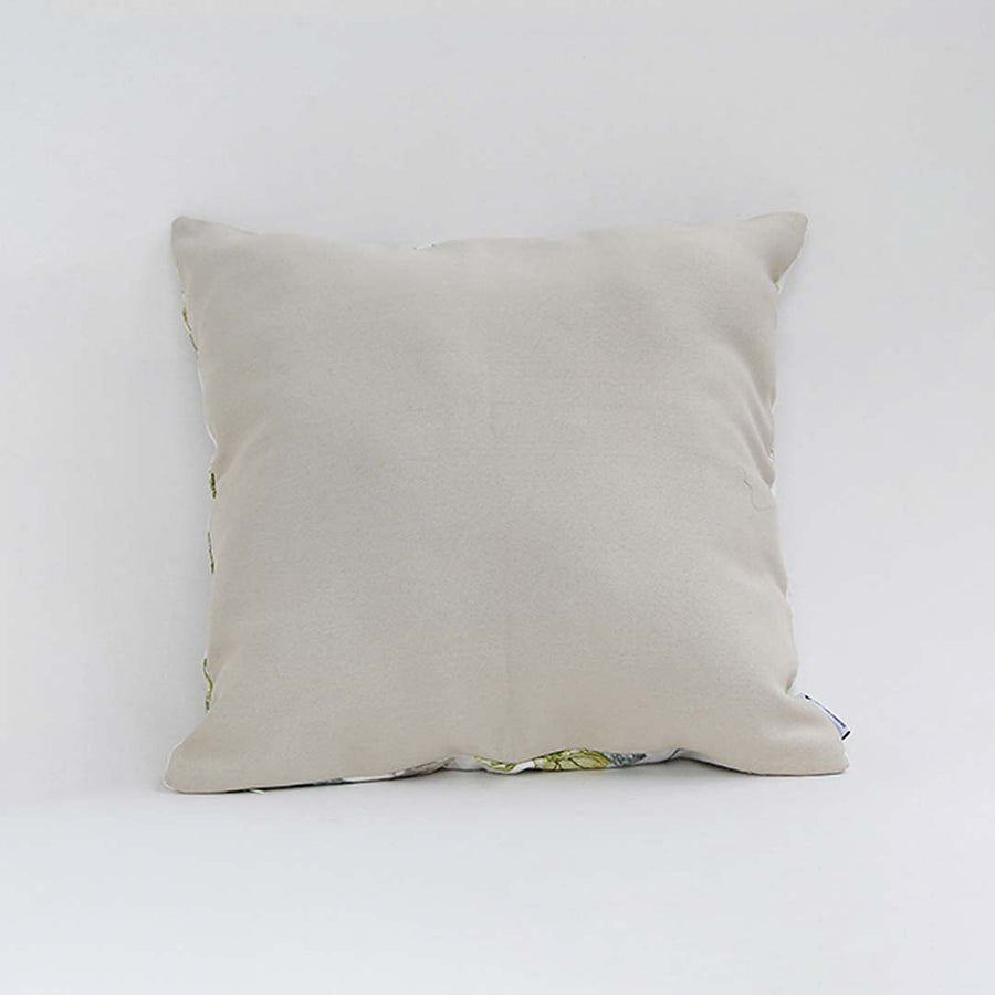 Backside of the cushion cover in soft beige cotton fabric offering a clean minimal décor style with a breathable durable and skin friendly material suitable for modern home settings.