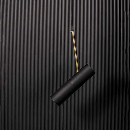 Contemporary black cylindrical pendant lamp with golden detail elegant ceiling light fixture for modern home interior styling.