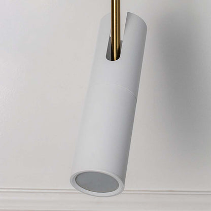 Closeup of elegant white cylindrical pendant light with golden detail modern ceiling lamp for luxury home interior decoration.