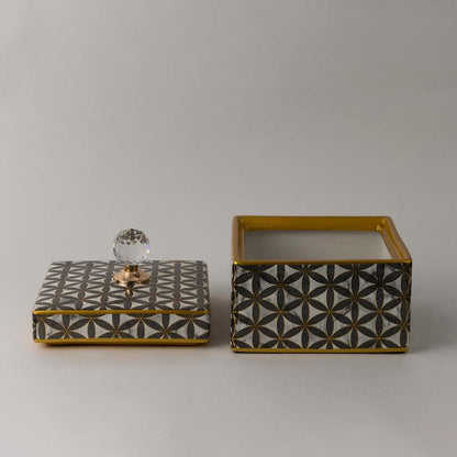 Modern ceramic decor jar with crystal top and black gold geometric artwork perfect for home or tabletop display.