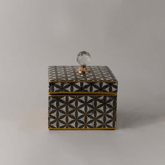 Elegant handcrafted ceramic jar with gold geometric pattern and crystal lid accent ideal for luxury home styling.