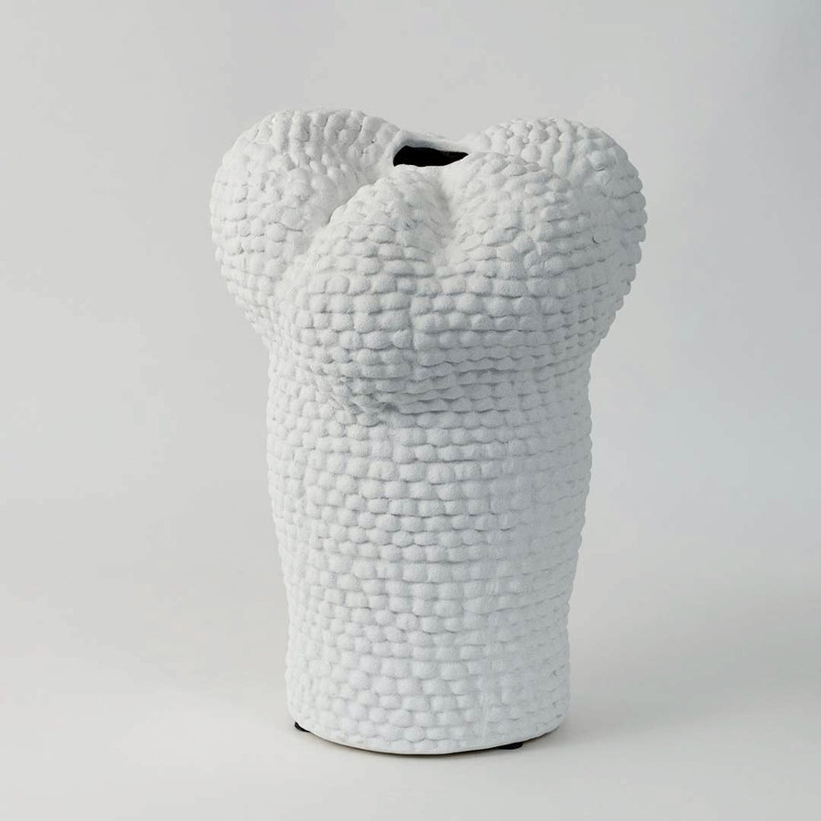 Minimal Pebble vase on a clean white background focusing on its organic curvy silhouette and pebble-inspired ceramic finish.