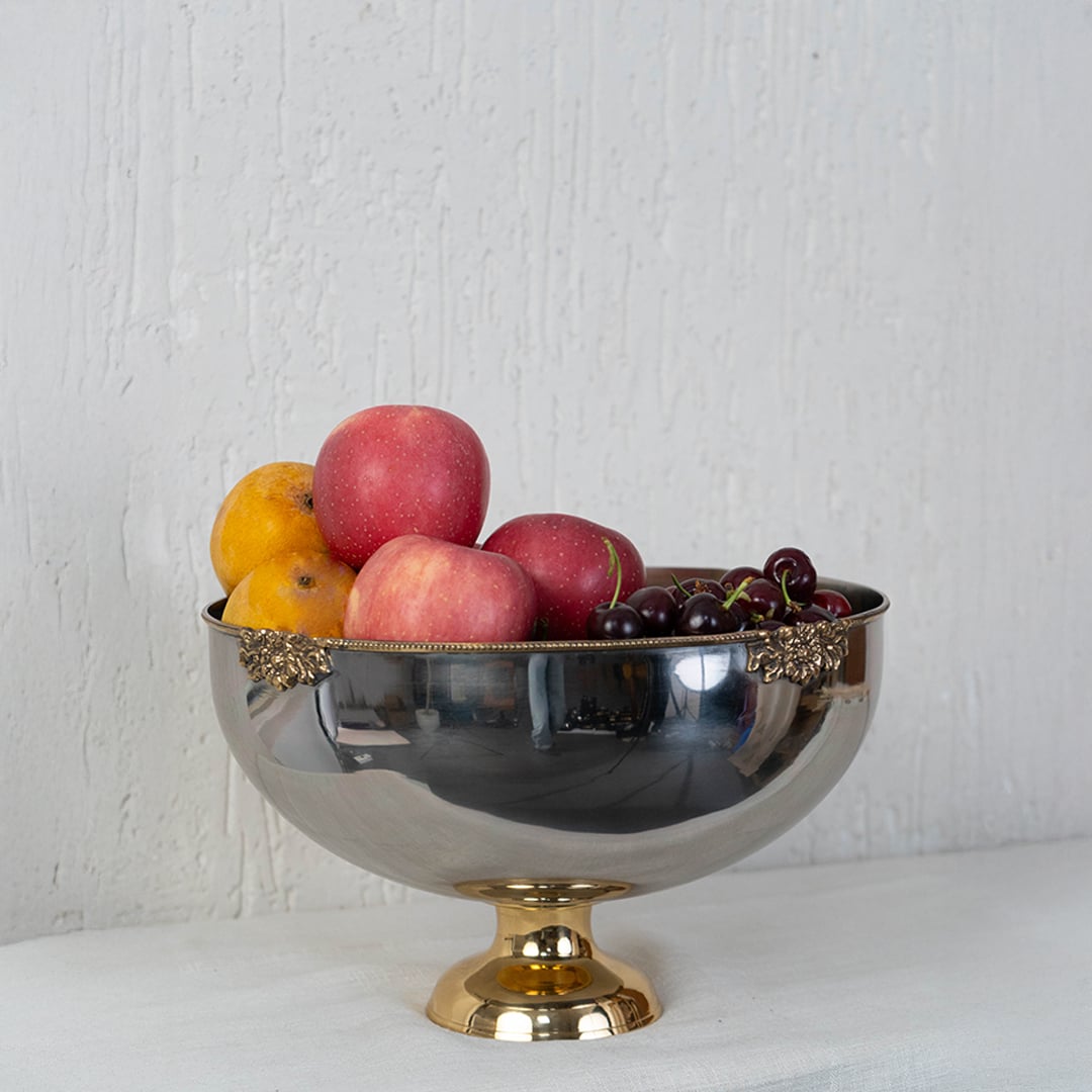 Silver and gold fruit bowl packaged inside premium black box with inner cushioning for gifting and safe transit.