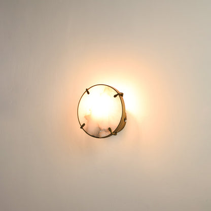 Modern marble wall light with warm ambient glow for elegant hallway and luxury decor styling spaces.