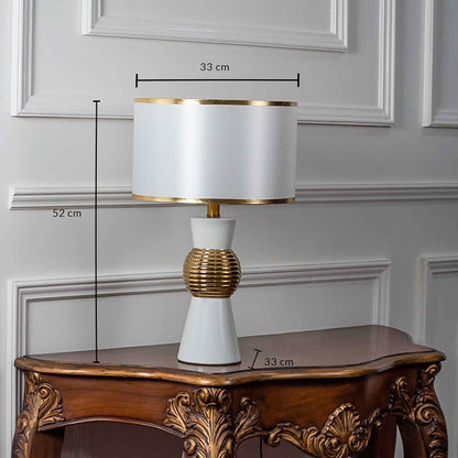 Dimensions of white and gold table lamp with textured golden round base measuring 52 cm height and 33 cm width.