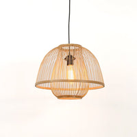 Open frame bamboo pendant light illuminated with warm glow for elegant boho decor style.