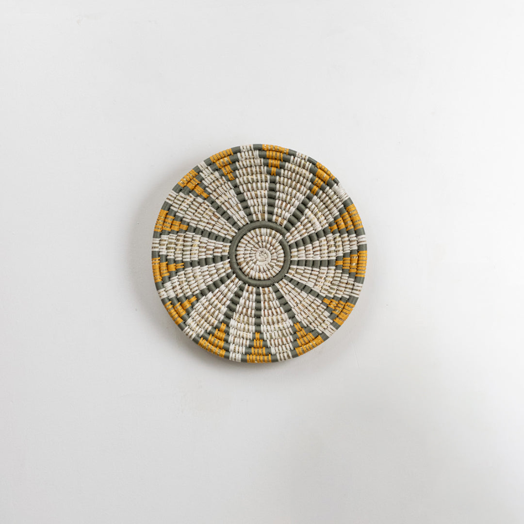 White decorative wall plate with gold floral mandala pattern for elegant wall styling and luxury home decor.