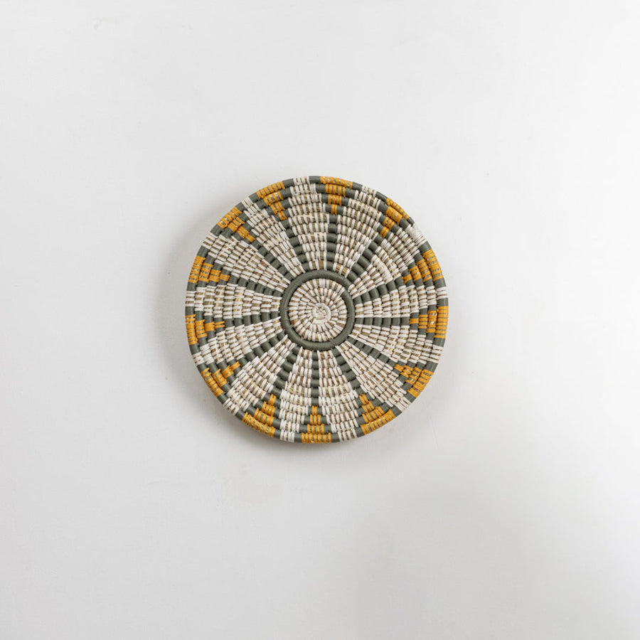 White decorative wall plate with gold floral mandala pattern for elegant wall styling and luxury home decor.
