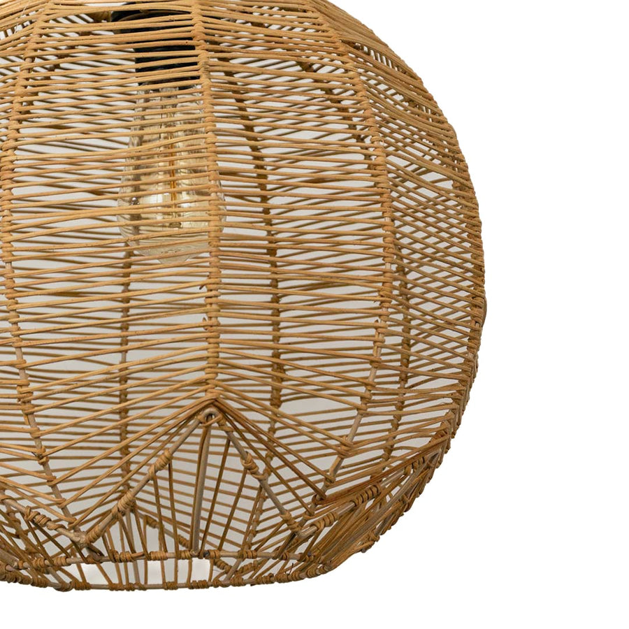 Closeup of rattan pendant light showcasing intricate handmade craftsmanship and fine weaving.