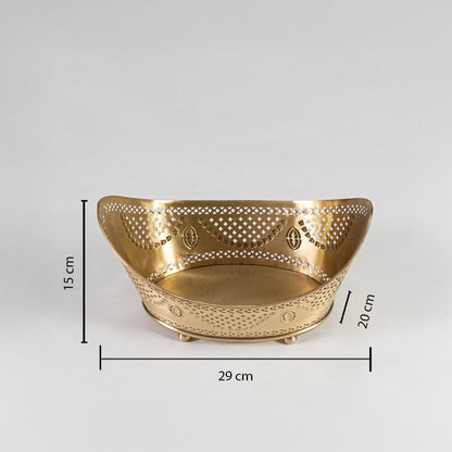 Gold metal fruit bowl with cutout design shown with 28.5 cm width 20 cm depth and 13.5 cm height on white background.