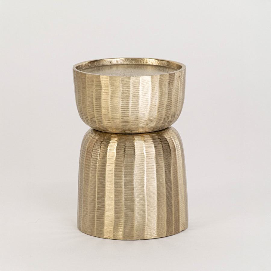 Gold metal decorative candle holder on white background with textured finish for modern tabletop decor.