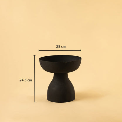 Black pedestal bowl with matte finish shown with 28 cm width and 24.5 cm height for modern artistic home decor.