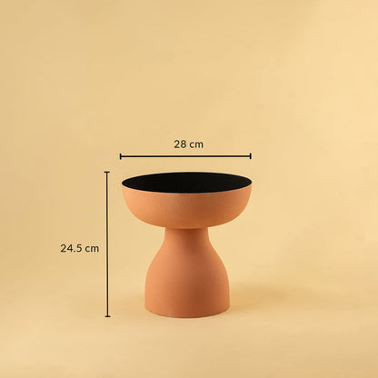 Terracotta orange pedestal bowl with black interior shown with 28 cm width and 24.5 cm height for modern artistic home decor.