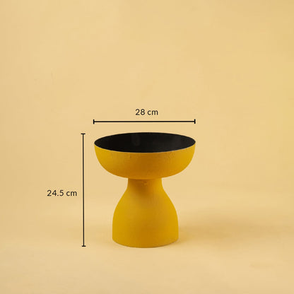 Yellow pedestal bowl with black interior shown with 28 cm width and 24.5 cm height for modern artistic home decor.