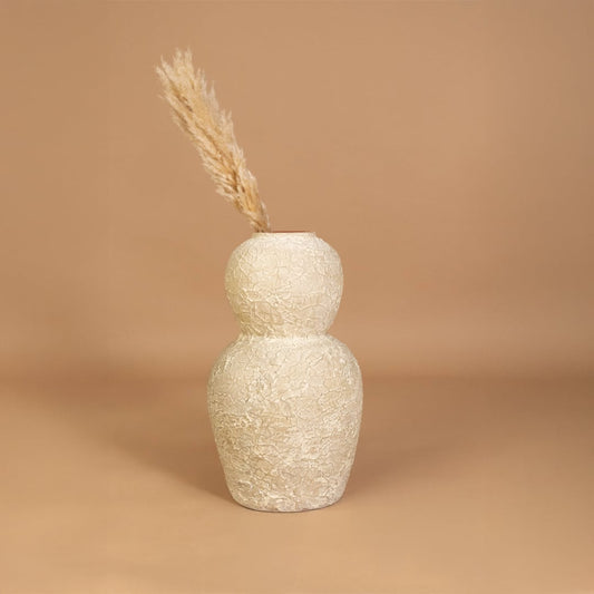 Cream textured decorative vase placed in a curated home setting enhancing shelves consoles and living spaces with natural artistic decor.