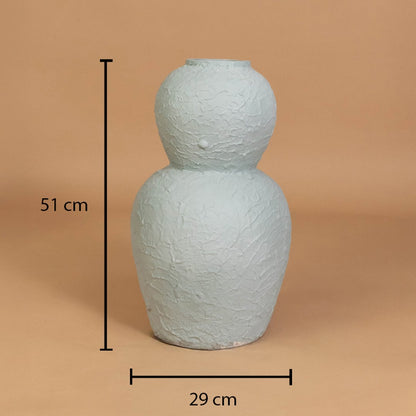 Textured light blue decorative vase shown with 51 cm height and 29 cm width for accurate placement in modern home interior decor settings.