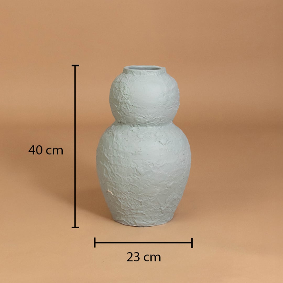 Light blue textured decorative vase shown with 40 cm height and 23 cm width for accurate placement in modern home interior decor settings.