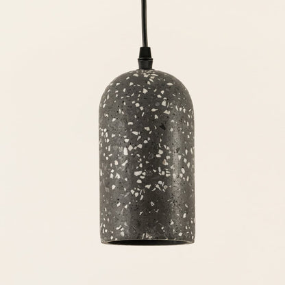 Detailed view of black terrazzo pendant light showcasing premium stone texture and elegant design.