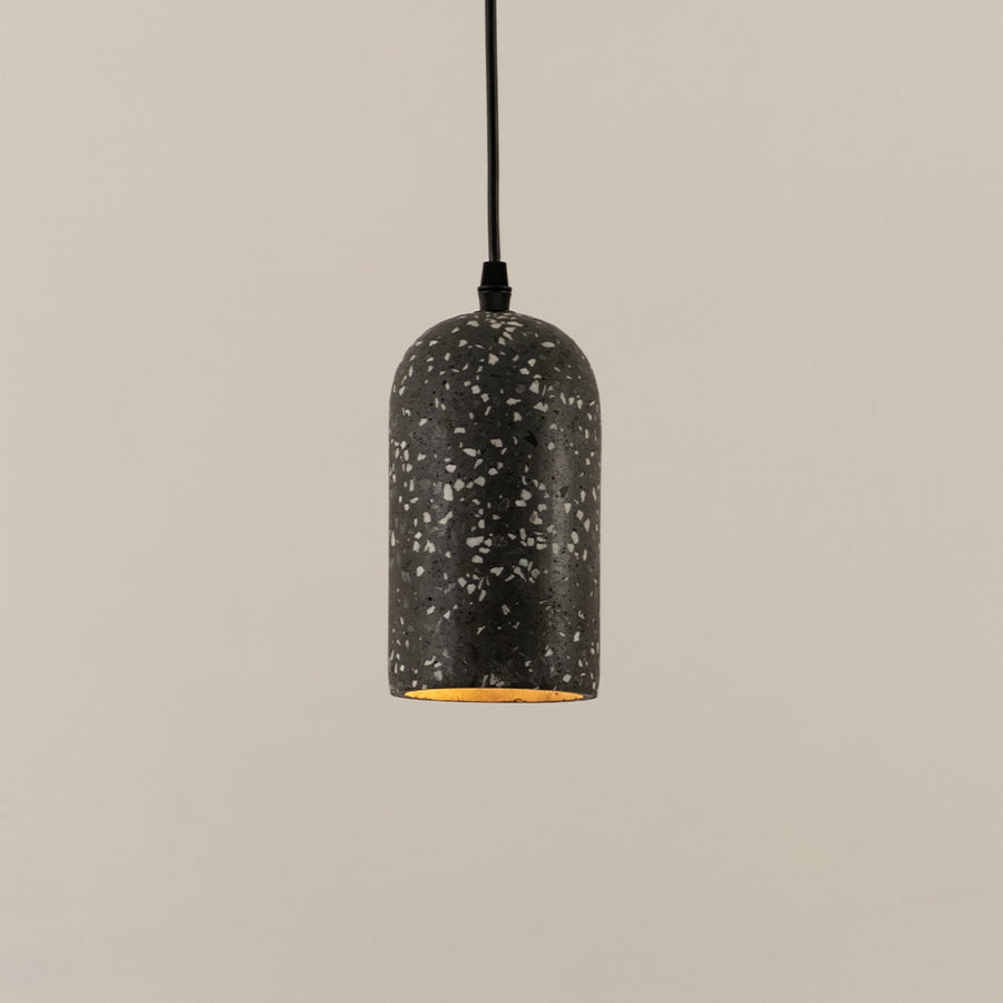 Black terrazzo pendant light with white speckled finish crafted for modern living spaces.