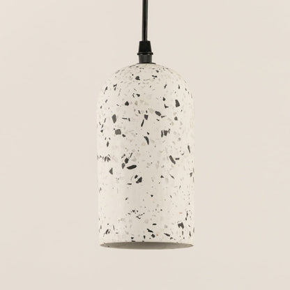 Closeup of white terrazzo pendant light showcasing premium stone texture and refined craftsmanship.
